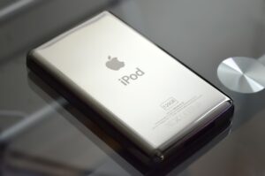 Apple Silver iPod 120GB Face Down on Glass Table